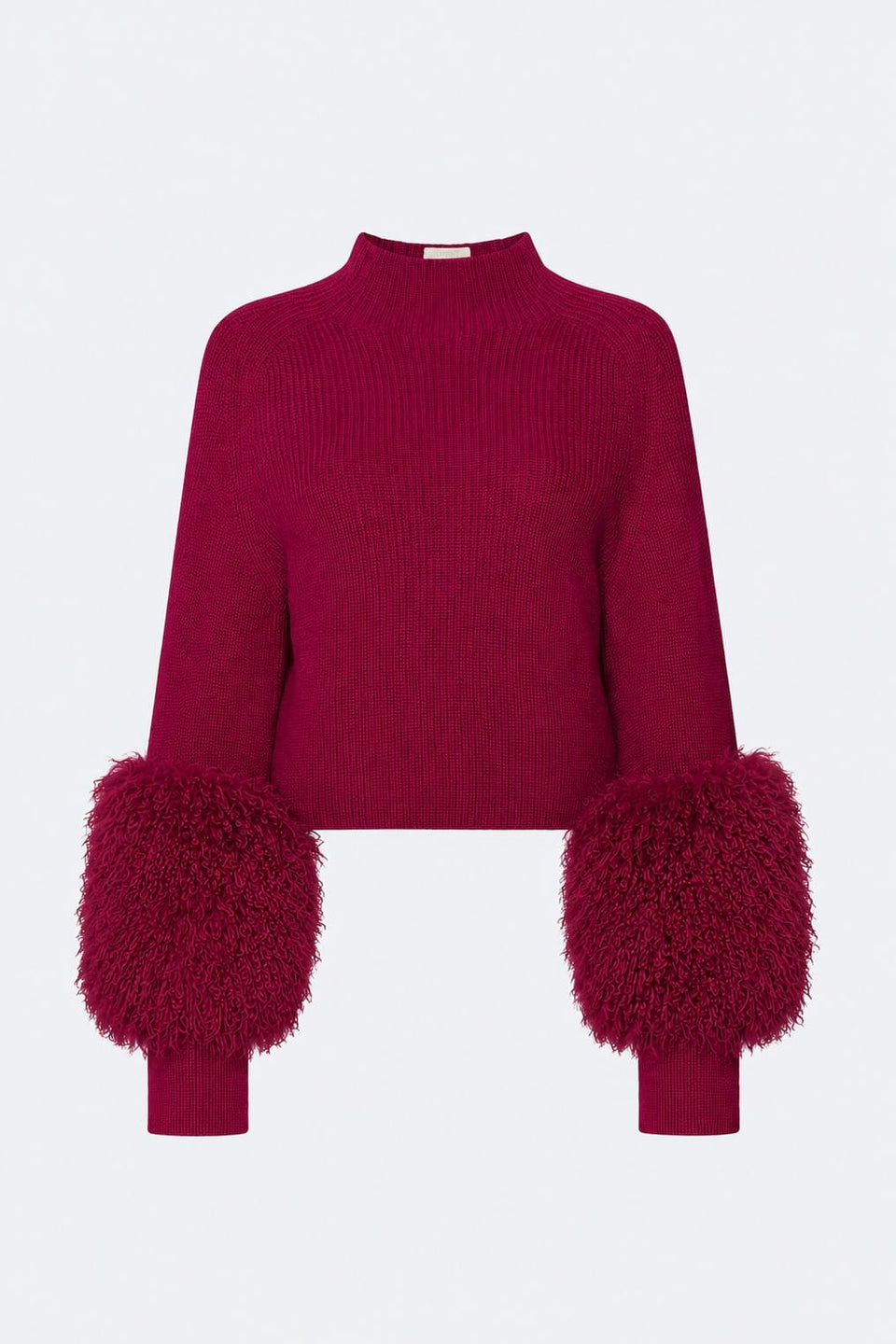 A deep magenta ribbed knit mock-neck sweater with voluminous, fluffy faux-fur pom-pom cuffs, shown against a plain light gray background.