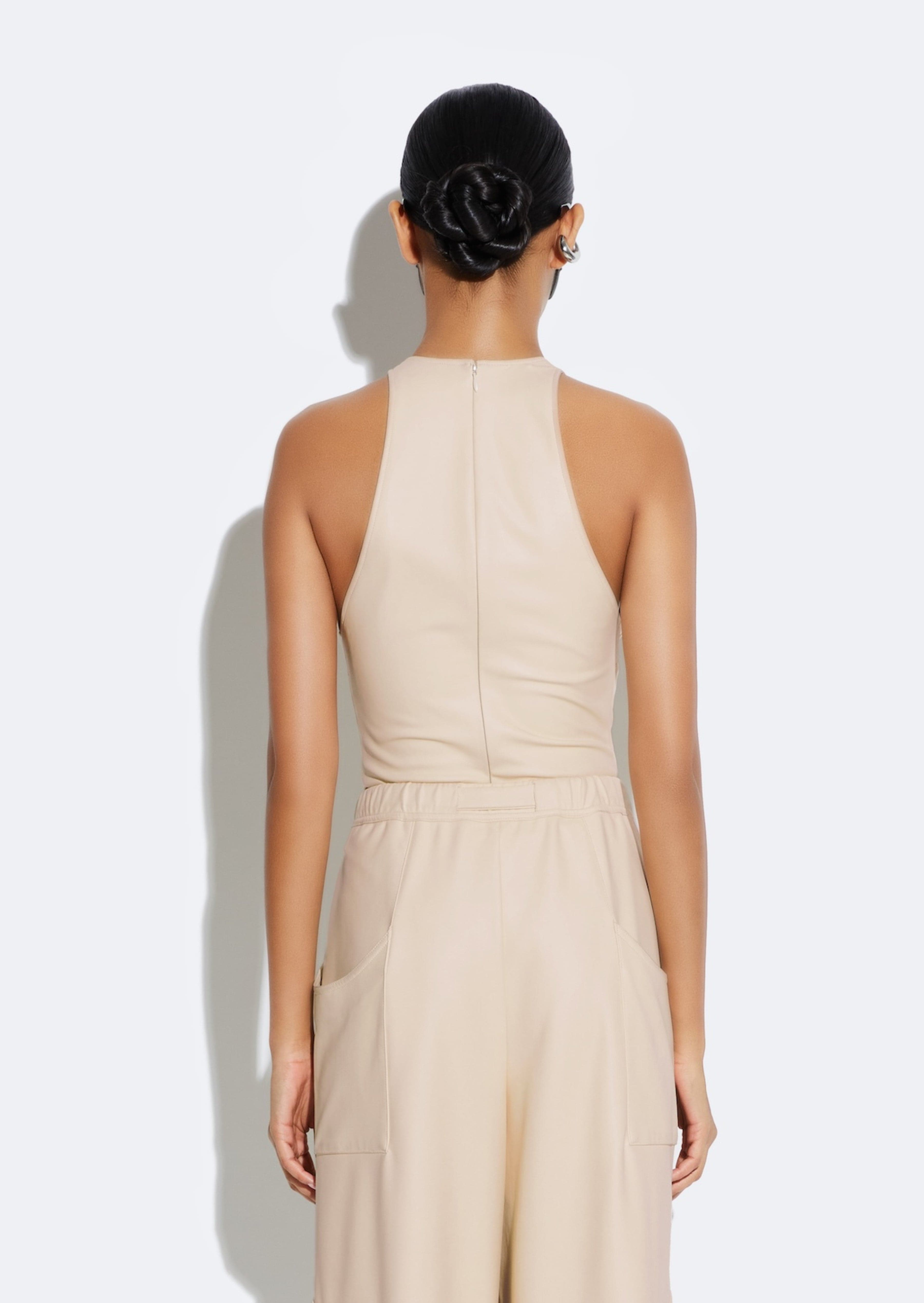 Stretch Faux Leather Plunge Neck Bodysuit in Ecru Tan and Neutral