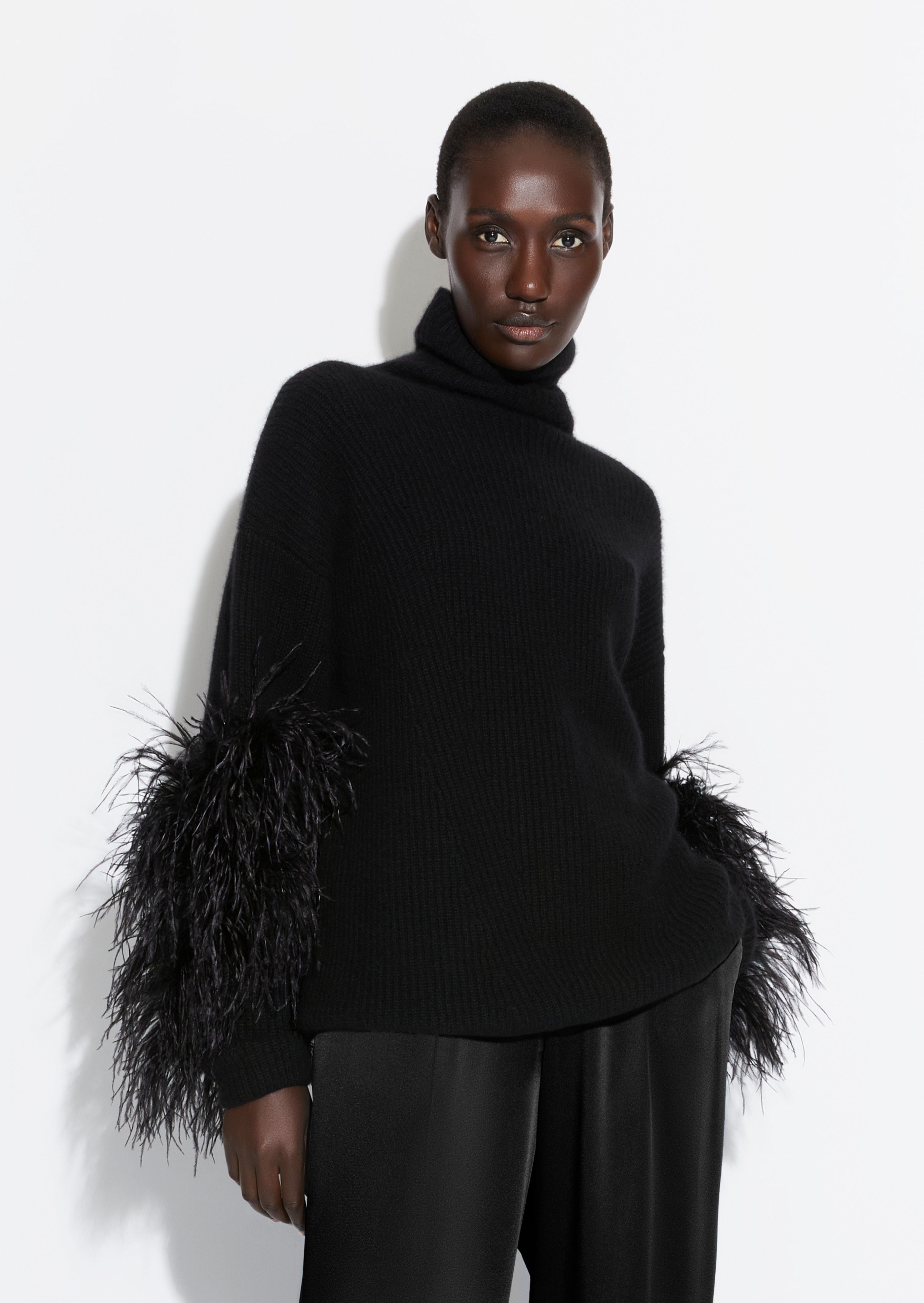 Jumpers with fur on sale sleeves