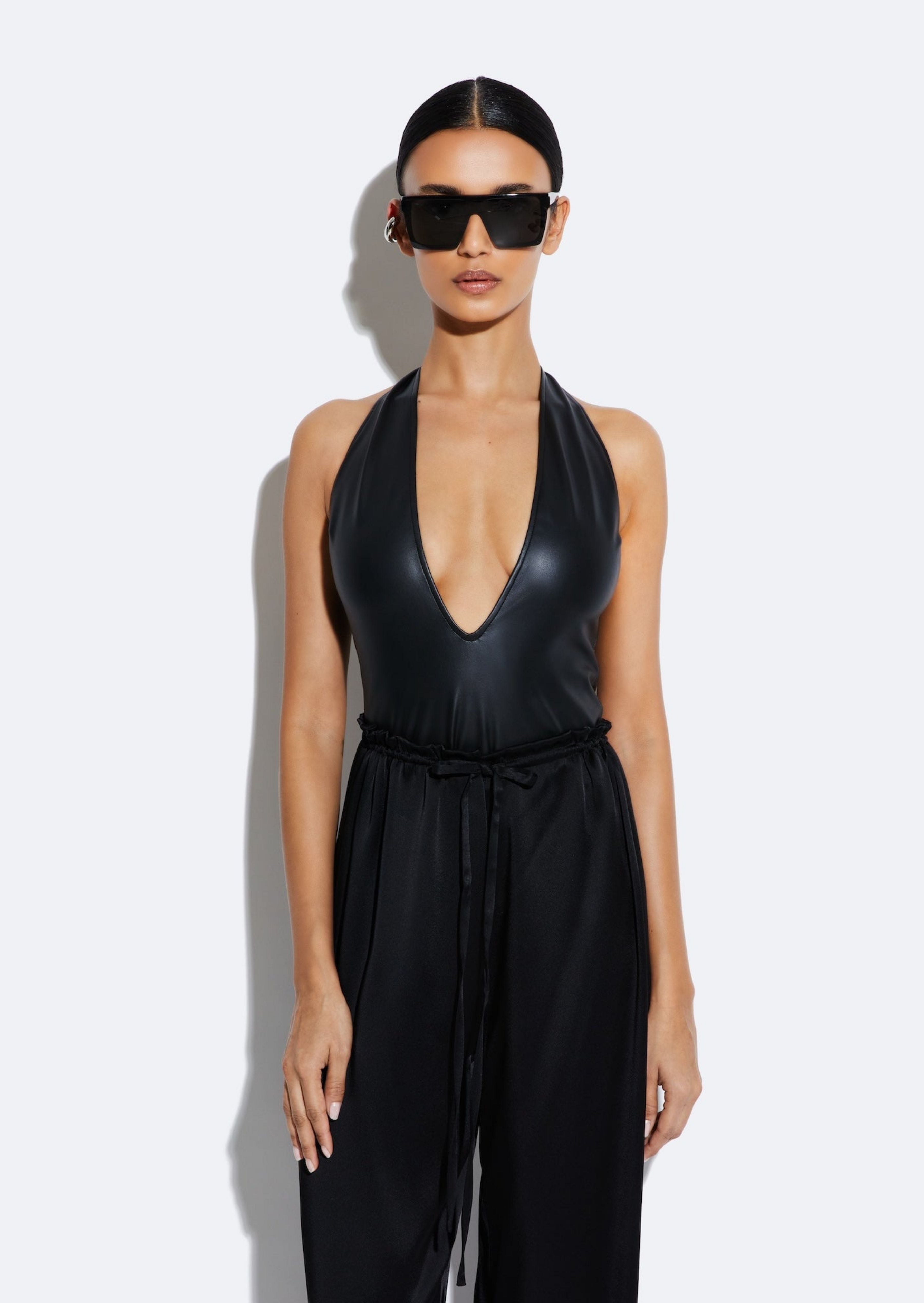 Stretch Faux Leather Plunge Neck Bodysuit